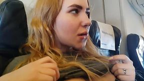 Handjob in the airplane with pretty blonde teen